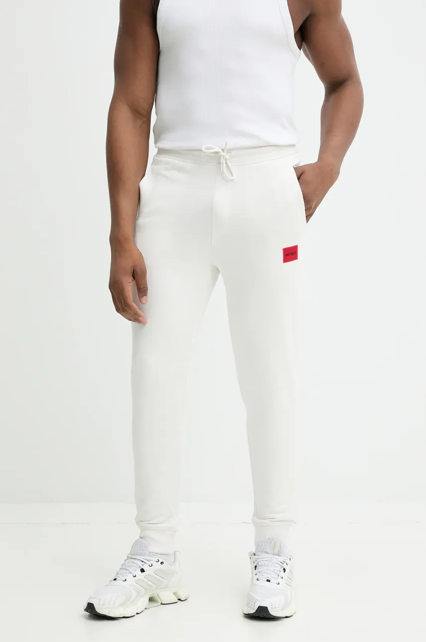 Bavlnené tepláky HUGO béžová farba, melanžové, 50447963